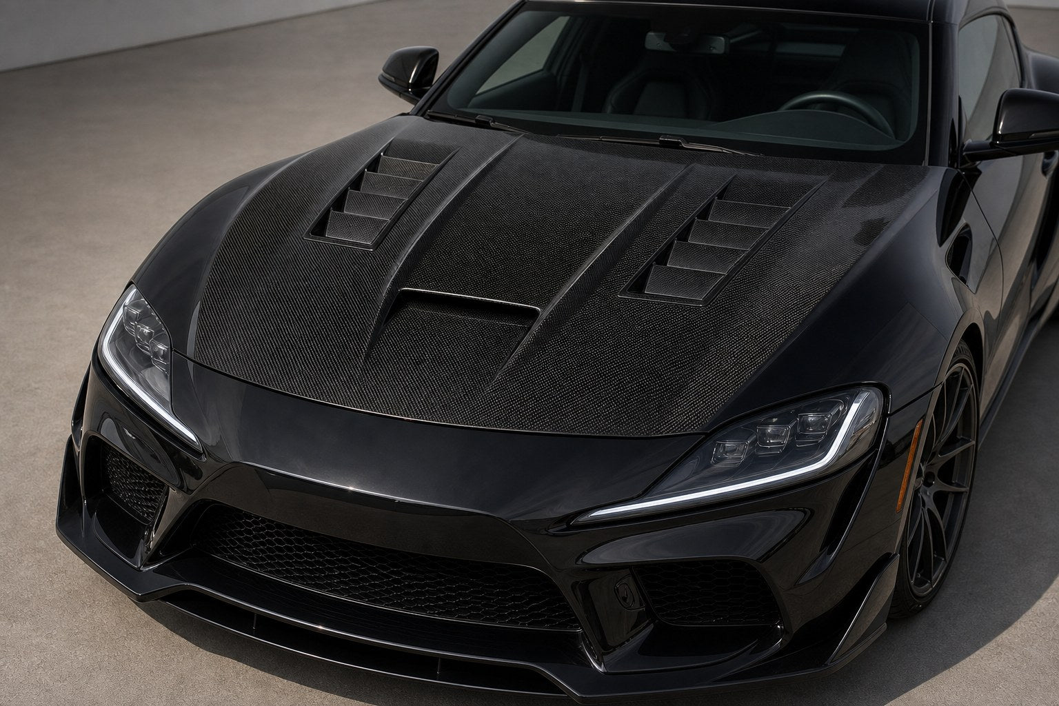 2020-2026 Toyota GR Supra A90/A91 Vented Carbon Fiber Hood - Installed context