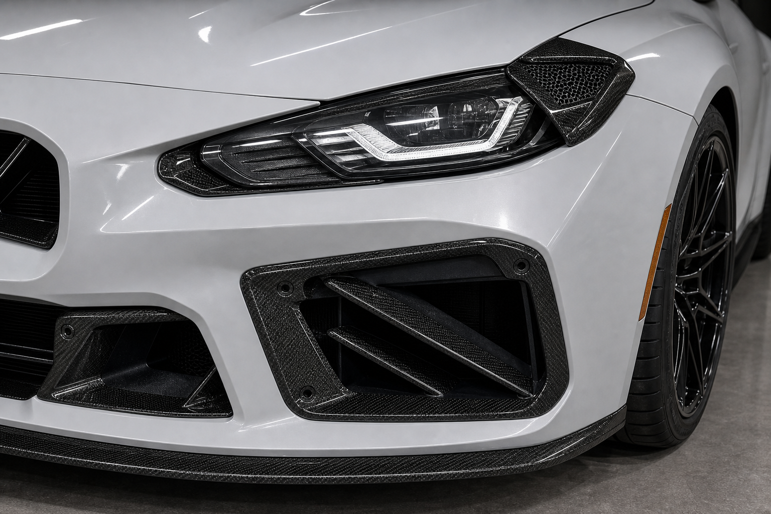 2021-2026 BMW 4 Series G22 Dry Carbon Fiber Headlight Cover Kit - Installed context